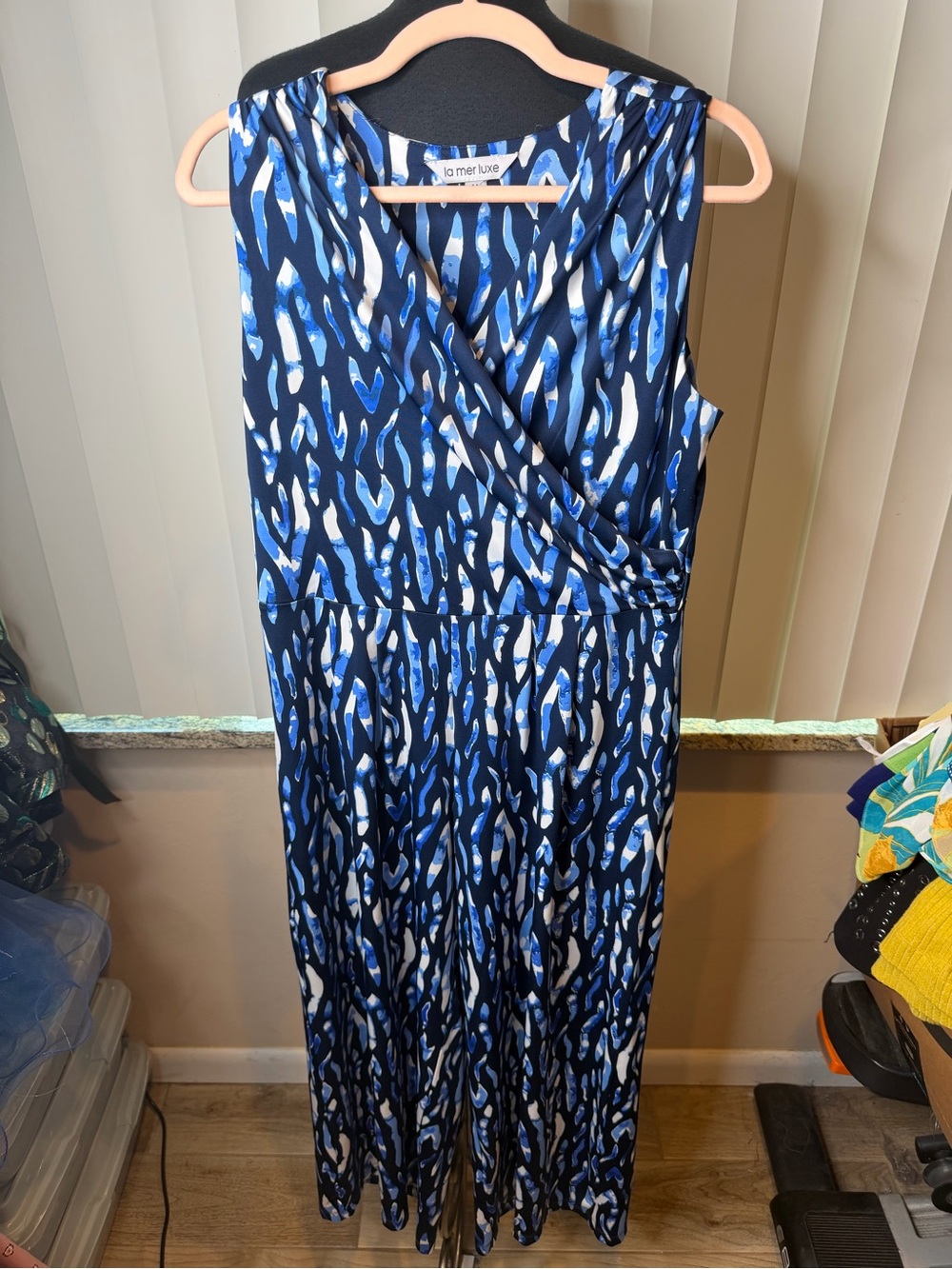 La Mer luxe V-neck faux-wrap jumpsuit in a blue and white abstract Size Medium